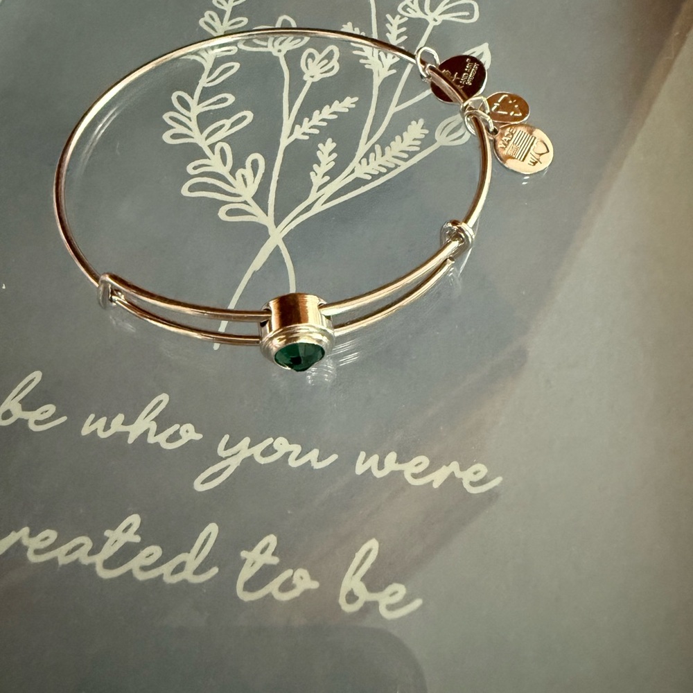 Elegant Bracelet with Green Charm